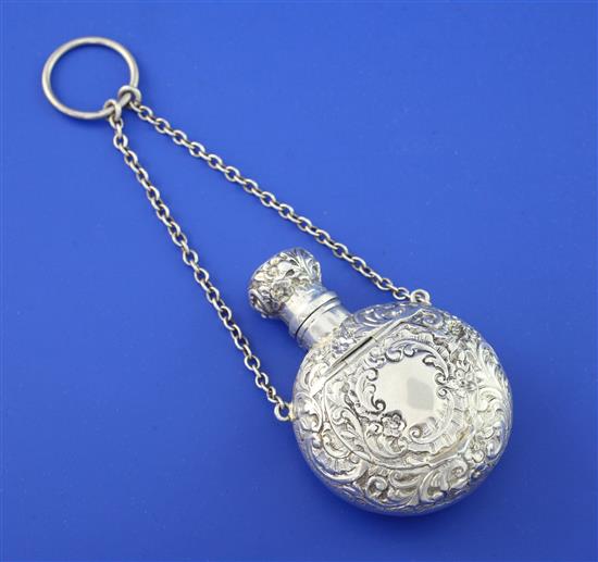 A late Victorian silver combination moon shaped scent flask and compact, 2.75in.